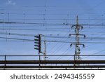 A high-voltage line that crosses the railway power lines.