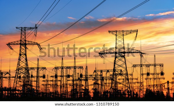 High-voltage  power lines.\
Electricity distribution station. high voltage electric\
transmission tower. Distribution electric substation with power\
lines and\
transformers.
