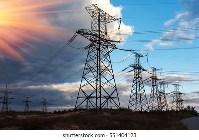  high-voltage  power lines at sunset. electricity distribution station. high voltage electric transmission tower. 