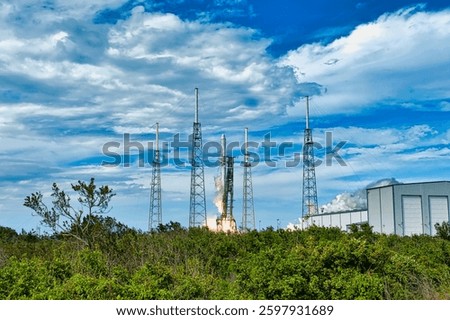 Highvoltage tower sky background. High voltage tower of transmission of electric energy. Summer meadow with highvoltage towers. Electrical industry. Elements of this image furnished by NASA