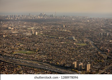 Highway 401 And 400 Black Creek Drive With Downtown Toronto City Skyline On Lake Ontario