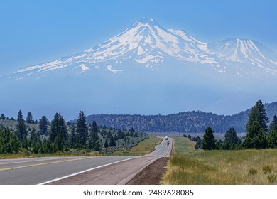 Highway 97 extends into the distance toward the snow-capped Mount Shasta - Powered by Shutterstock