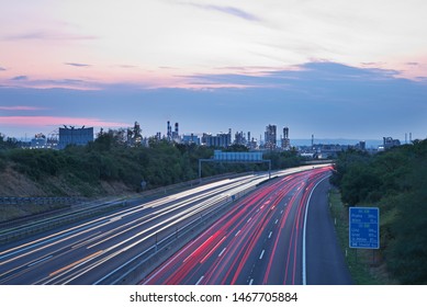 Highway A4 At A Refinery And Petrochemical Industrial Plant In Austria At Dusk.