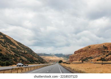 Highway Among Beautiful Mountains. Beautiful Road Landscape With Mountains And High Sky With Clouds. Echo Canyon, Utah 84017, USA - 08.02.2022