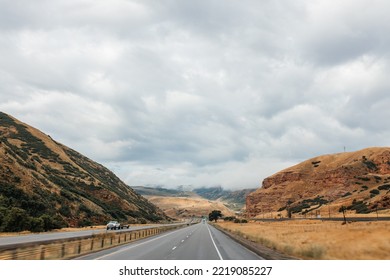 Highway Among Beautiful Mountains. Beautiful Road Landscape With Mountains And High Sky With Clouds. Echo Canyon, Utah 84017, USA - 08.02.2022