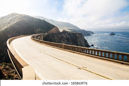 Highway Between Mountains And Pacific Ocean. Bixby Bridge At Big Sur 