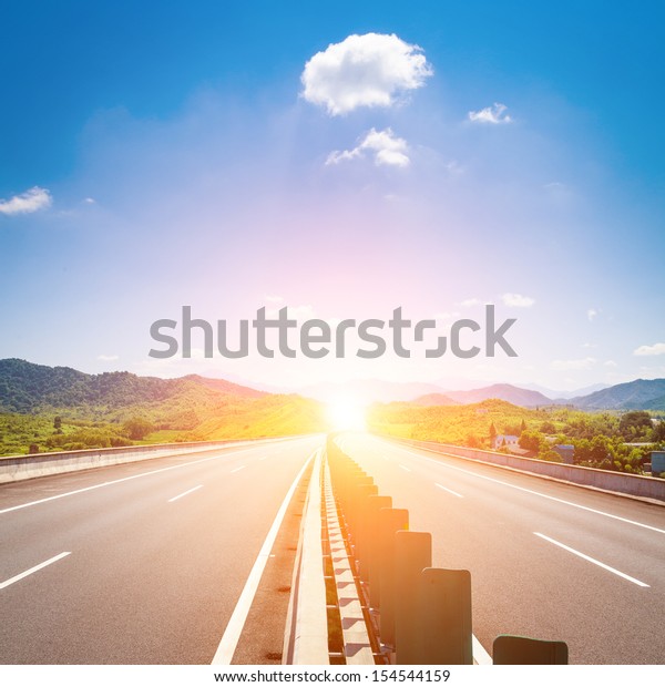 Highway, blue sky, sunny\
weather