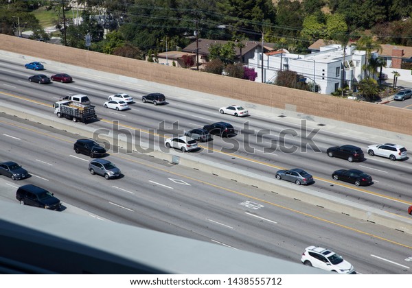 Highway with cars\
running, U.S.A\
California
