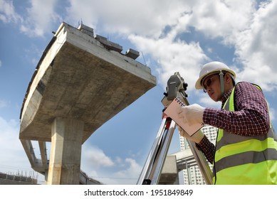 Highway Construction Surveying. Land Surveyor For Road Placement, An Analysis Of The Current Ground Is Required Before Startup Construction Work