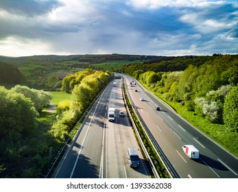 Highway in Germany with cars and sky with big clouds
