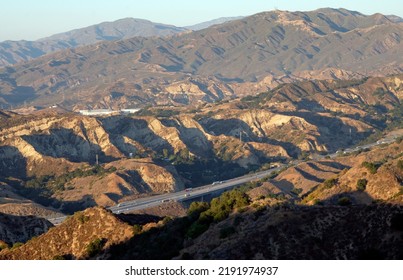 A Highway Going Through The Californian Scenery Near Valencia, CA