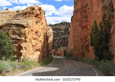 Highway going thru narrow solid rock
