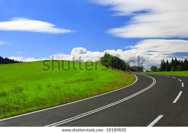 Highway to\
Heaven - The road on a sunny summer\
day