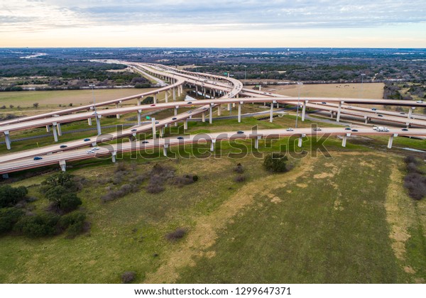 Highway\
interchange with open land around the area as highways and\
interstates run across our entire\
nation