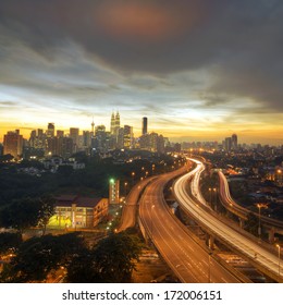 A Highway Lead To Kuala Lumpur City During Sunset