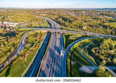 Highway multilevel crossing. Spaghetti junction on A4 international motorway, the part of freeway around Krakow, Poland. Aerial view 