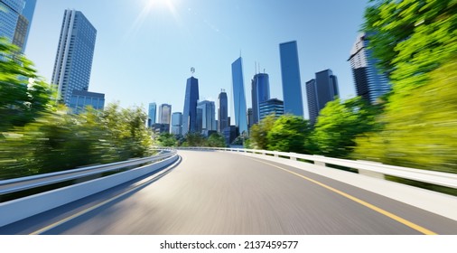 Highway overpass motion blur with city background - Shutterstock ID 2137459577
