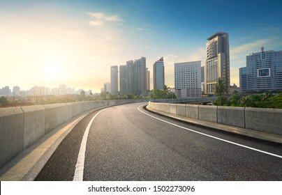 Highway overpass motion blur effect with modern city background. - Powered by Shutterstock