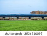 Highway overpass in a rural green landscape