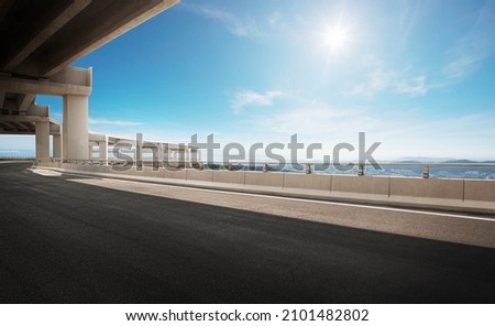 Highway overpass under the beautiful blue sky.