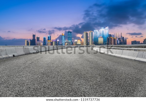 Highway pavement and skyline of Qingdao\
urban construction\
\
