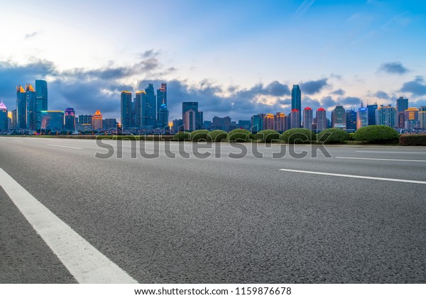 Highway pavement and skyline of Qingdao\
urban construction\
\
