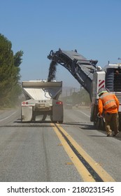 Highway Road Crew Workers Laying New Asphalt