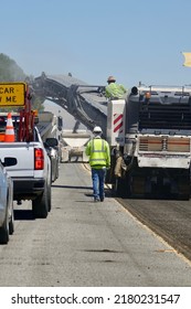 Highway Road Crew Workers Laying New Asphalt