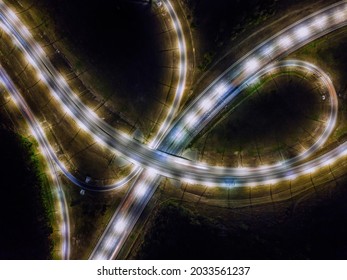 Highway Road Junction At Night, Top Directly Above View.