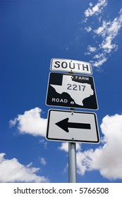 Highway Sign Denoting South Texas Farm Road With Arrow.