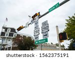 Highway signs along Main Street in Fredericksburg, Texas in the hill country.