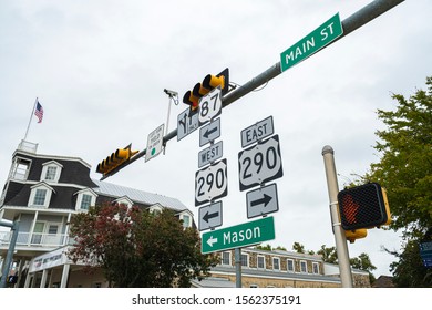 Highway Signs Along Main Street In Fredericksburg, Texas In The Hill Country.