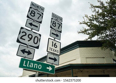 Highway Signs Along Main Street In Fredericksburg, Texas In The Hill Country.