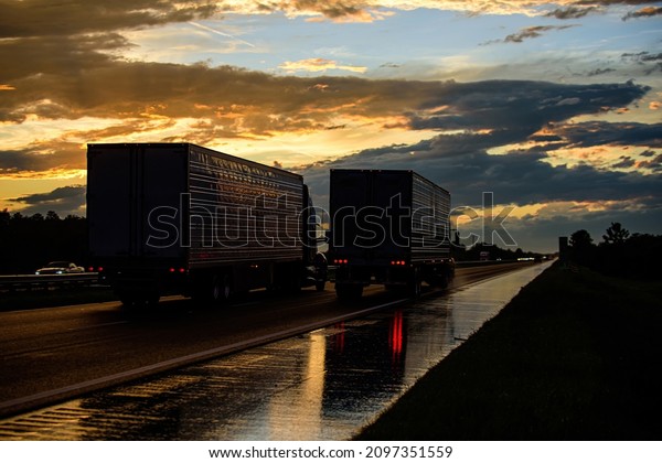 Highway at sunset. American truck on a beautiful\
road. All life is like a\
road