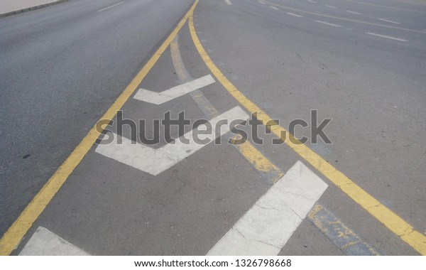 Highway\
Tarmac Road with marking sign or yellow line or marks and\
Subsidiary road connecting with main road and \
