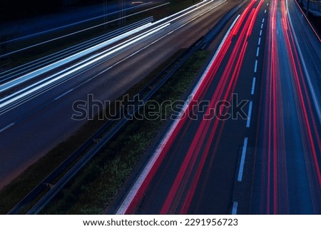 Highway traffic with light trails