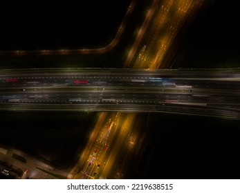  Highway Traffic At Night. Motorway Infrastructure In Darkness Light Of Dynamic Moving Traffic On The Road At Amsterdam Ijburg In The Netherlands. Aerial Drone Night Photography. Overhead Overview.