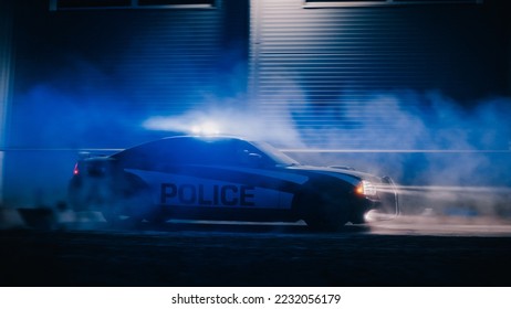 Highway Traffic Patrol Car In Pursuit of Criminal Vehicle. Police Officers in Squad Car Chase Suspect on Road During a Misty Night. Cinematic Industrial Area. Action Scene - Shutterstock ID 2232056179