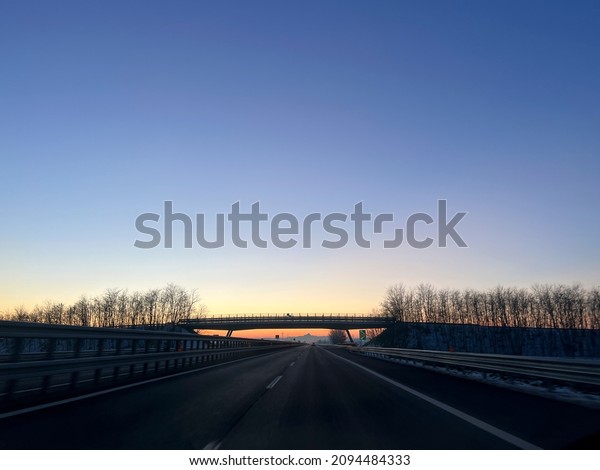 highway trip sunset in the background in Italy.\
High quality photo