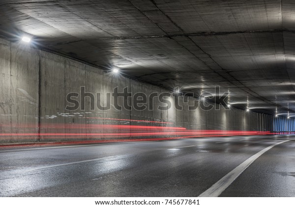 Highway tunnel. Interior of an urban tunnel without\
traffic. 