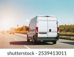 Highway with a white cargo van ahead