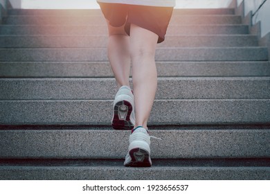 Hiit Workout Cardio Running Jogging Up The Stairs Training. Staircase Climbing Run Woman Going Run Up Steps. Runner Athlete Doing Cardio Sport Workout.