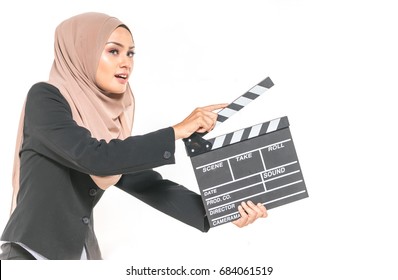 Hijab Girl Holding A Clapper Board. Filmmaking Or Film Production Concept