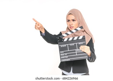 Hijab Girl Holding A Clapper Board. Filmmaking Or Film Production Concept