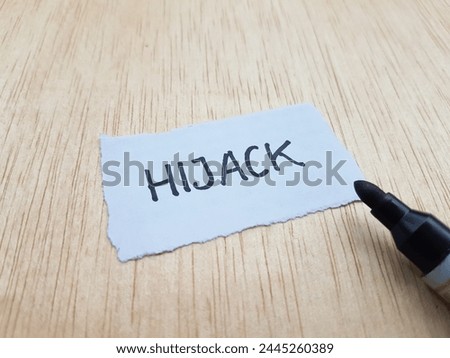 Hijack writting on table background.