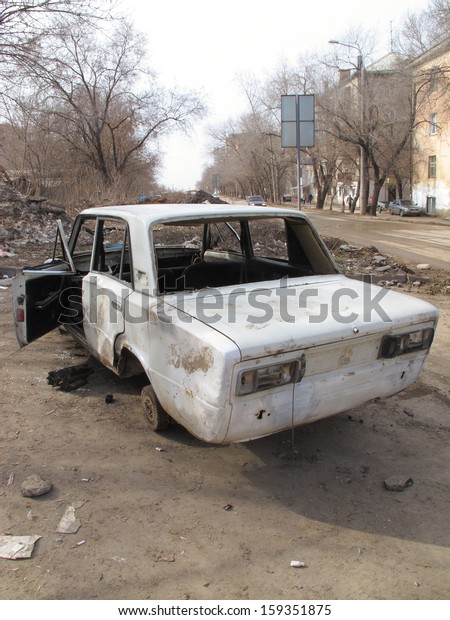 Hijacked and\
a crashed car in the spring city\
street