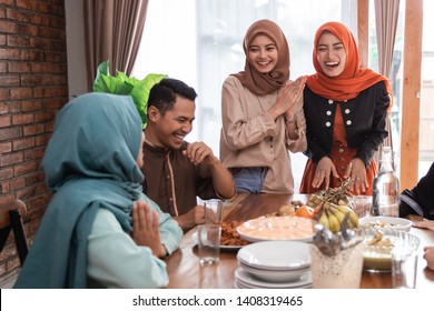 The Hijrah Family Together Enjoy The Iftar Meal In The Dining Room