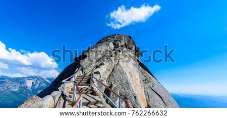 Hike on Moro Rock Staircase toward mountain top, granite dome rock formation in Sequoia National Park, Sierra Nevada mountains, California, USA