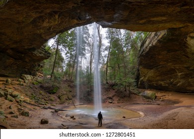 Hiker at Ash Cave in Hocking Hills, Ohio