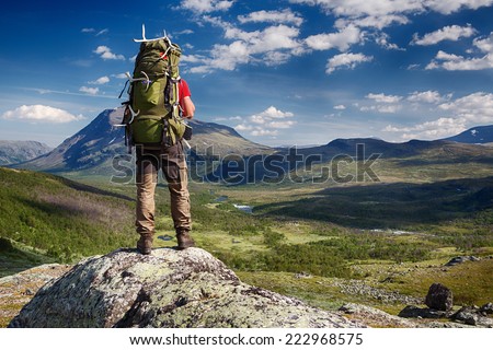 Hiker with Backpack in the wilderness of northern Sweden